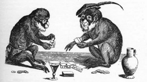 deux singes jouant au cartes